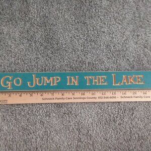 Go jump in the lake sign